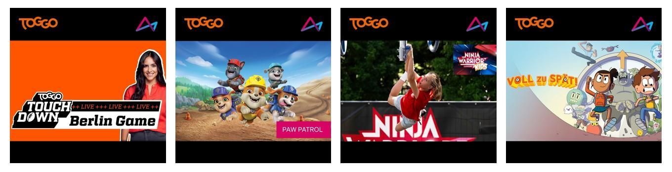 Das Bild zeigt vier verschiedene Sendungen, die auf TOGGO präsentiert werden. Links ist das 'TOGGO Touch Down Berlin Game' mit einer Person im Vordergrund zu sehen. Daneben ist ein Bild von 'Paw Patrol', einer animierten Serie mit Hundewelpen in Abenteuersituationen. In der dritten Darstellung sieht man einen sportlichen Wettkampf mit 'Ninja'. Rechts ist eine Zeichentrickserie mit dem Titel 'Voll der Spaß' abgebildet, die zwei animierte Charaktere zeigt.
#!#
TOGGO,Touch Down,Berlin Game,Paw Patrol,Animation,Ninja,Wettkampf,Zeichentrick,Unterhaltung,Kindersendungen